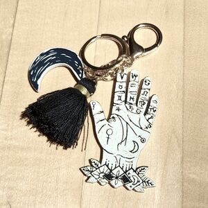 Metaphysical Crescent Moon Hand Tassle Keychain Gold Tone